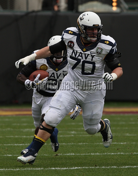 122912 Kraft SA-024.JPG - Dec 29, 2012; San Francisco, CA, USA; Navy Midshipmen tackle Graham Vickers (71)  blocks for Gee Gee Greene (21) against the Arizona State Sun Devils in the 2012 Kraft Fighting Hunger Bowl at AT&T Park.